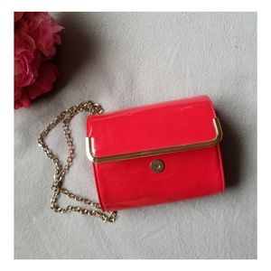 Red glossy crossbody